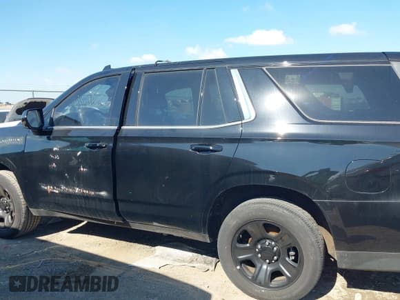 ✅ 2023 Chevrolet Tahoe Commercial • VIN: 1GNSCLED8PR162548 • Lot: 42211782. Listed on IAAI with 7,083 mi. Free auction sales archive from the USA and detailed vehicle history report at DreamBid. Image 14.