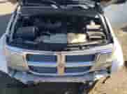 2008 Dodge Nitro SXT z VIN 1D8GU28K68W197352, wystawiony jako Copart lot #73792214 z przebiegiem 229 221 mil mil oraz Nie do naprawy • Non repairable. Historia ofert i sprzedaży dostępna na DreamBid. Obrazek 12.