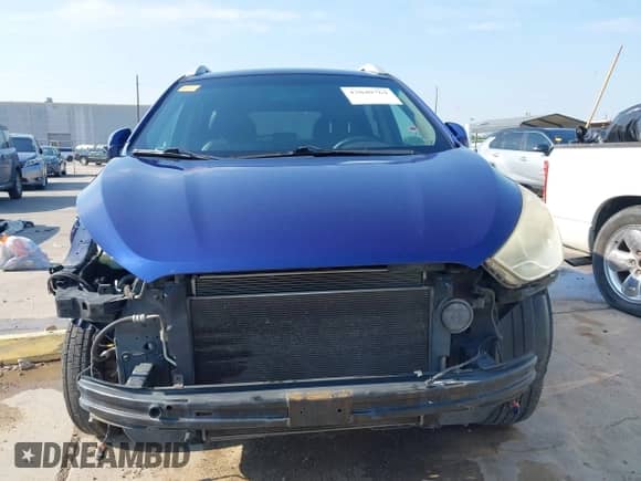 2013 Hyundai Tucson GLS z VIN KM8JU3AC9DU561035, wystawiony jako IAAI lot #43040764 z przebiegiem 145 743 mil mil oraz . Historia ofert i sprzedaży dostępna na DreamBid. Obrazek 13.