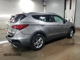 ✅ 2018 Hyundai Santa Fe 2.4L • VIN: 5NMZUDLB0JH054030 • Лот: 73499722. Опубликован ранее на Copart с пробегом 102 625 миль. Бесплатный доступ к архиву аукционных продаж из США и подробный отчёт об истории автомобиля на DreamBid. Изображение 3.