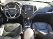 ✅ 2015 Jeep Cherokee Trailhawk • VIN: 1C4PJMBS8FW549081 • Lot: 92130325. Listed on Copart with 157,279 mi. Free auction sales archive from the USA and detailed vehicle history report at DreamBid. Image 8.