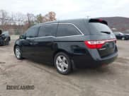 ✅ 2011 Honda Odyssey Touring • VIN: 5FNRL5H90BB014208 • Lot: 43682256. Listed on IAAI with 169,536 mi. Free auction sales archive from the USA and detailed vehicle history report at DreamBid. Image 3.