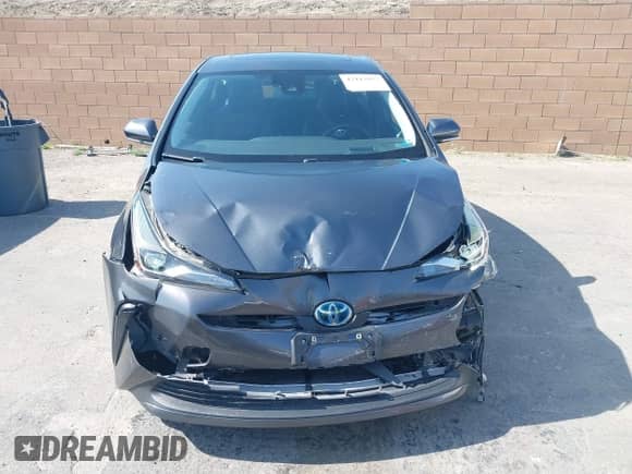 2021 Toyota Prius L Eco with VIN JTDKAMFU4M3144985, listed as a IAAI auction lot 42443957 with 20,816 mi miles and . Bid and sale history available at DreamBid. Image 12.