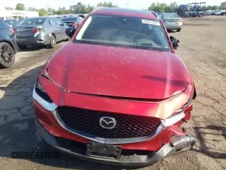 ✅ 2021 Mazda CX-30 Premium • VIN: 3MVDMBDY2MM265585 • Lot: 56051584. Wystawiony na Copart z przebiegiem 20 156 mil. Bezpłatny archiwum sprzedaży aukcyjnych z USA i szczegółowy raport historii pojazdu na DreamBid. Zdjęcie 5.