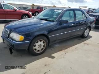 ✅ 1996 Mercedes-Benz C • VIN: WDBHA28E3TF392659 • Лот: 75169934. Опубликован ранее на Copart с пробегом Не указан. Бесплатный доступ к архиву аукционных продаж из США и подробный отчёт об истории автомобиля на DreamBid. Изображение 1.