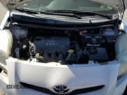 ✅ 2009 Toyota Yaris • VIN: JTDKT903495243325 • Lot: 84933435. Listed on Copart with 129,461 mi. Free auction sales archive from the USA and detailed vehicle history report at DreamBid. Image 11.