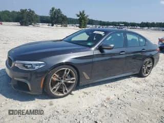 ✅ 2018 BMW 5 Series M550i xDrive • VIN: WBAJB9C55JB035565 • Лот: 69089415. Опубликован ранее на Copart с пробегом 48 913 миль. Бесплатный доступ к архиву аукционных продаж из США и подробный отчёт об истории автомобиля на DreamBid. Изображение 1.