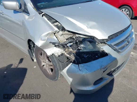 ✅ 2005 Honda Odyssey EX-L • VIN: 5FNRL38655B036820 • Lot: 43633450. Listed on IAAI with 207,568 mi. Free auction sales archive from the USA and detailed vehicle history report at DreamBid. Image 6.