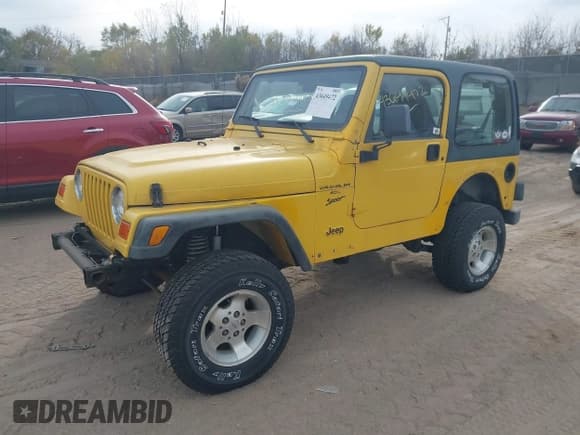 ✅ 2000 Jeep Wrangler Sport • VIN: 1J4FA49S2YP735627 • Lot: 43649472. Listed on IAAI with 140,099 mi. Free auction sales archive from the USA and detailed vehicle history report at DreamBid. Image 2.