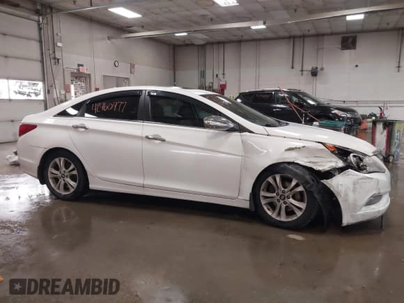 ✅ 2011 Hyundai Sonata Limited • VIN: 5NPEC4AC9BH035431 • Lot: 42960977. Listed on IAAI with 185,739 mi. Free auction sales archive from the USA and detailed vehicle history report at DreamBid. Image 13.