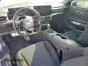 2025 Ford Mustang EcoBoost with VIN 1FA6P8TH5S5121950, listed as a Copart auction lot 69849265 with 1,023 mi miles and Clean title. Bid and sale history available at DreamBid. Image 8.