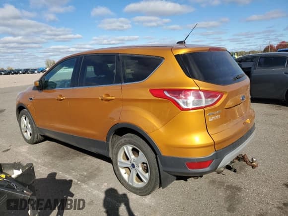 ✅ 2016 Ford Escape SE • VIN: 1FMCU9GX4GUB98928 • Lot: 82652455. Listed on Copart with 128,490 mi. Free auction sales archive from the USA and detailed vehicle history report at DreamBid. Image 2.