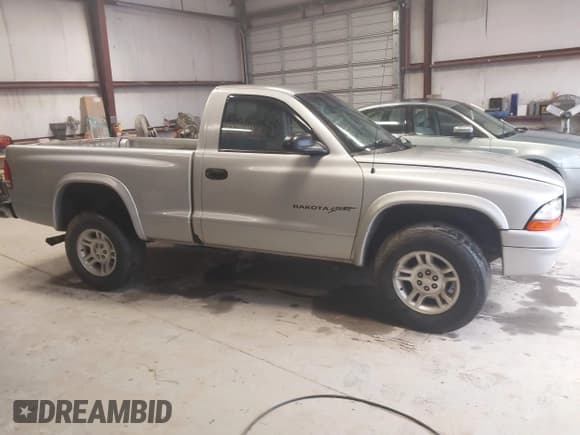 ✅ 2001 Dodge Dakota • VIN: 1B7GG26X21S118759 • Lot: 41943297. Wystawiony na IAAI z przebiegiem 156 372 mil. Bezpłatny archiwum sprzedaży aukcyjnych z USA i szczegółowy raport historii pojazdu na DreamBid. Zdjęcie 13.