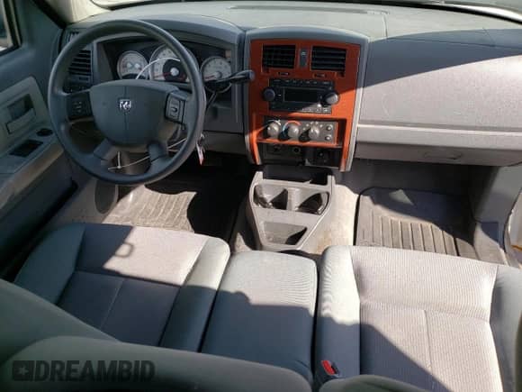 2005 Dodge Dakota SLT с VIN 1D7HW42N15S346853, выставлен на аукционе Copart как лот 75860094 с пробегом 182 727 миль миль и Списание • Salvage title. История ставок и продаж доступна на DreamBid. Изображение 8.