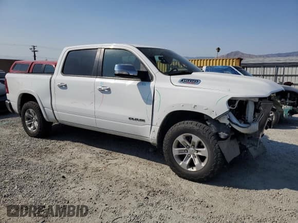 ✅ 2021 Ram 1500 Laramie • VIN: 1C6SRFJM0MN752123 • Lot: 80137645. Wystawiony na Copart z przebiegiem 123 238 mil. Bezpłatny archiwum sprzedaży aukcyjnych z USA i szczegółowy raport historii pojazdu na DreamBid. Zdjęcie 4.