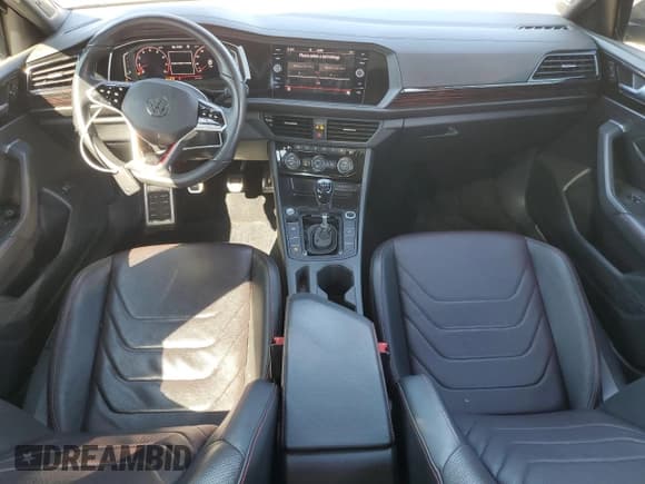 ✅ 2022 Volkswagen Jetta Autobahn • VIN: 3VW1T7BU3NM014481 • Lot: 69752085. Wystawiony na Copart z przebiegiem 31 172 mil. Bezpłatny archiwum sprzedaży aukcyjnych z USA i szczegółowy raport historii pojazdu na DreamBid. Zdjęcie 8.