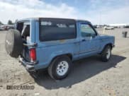 ✅ 1990 Ford Bronco • VIN: 1FMCU14T8LUA08609 • Lot: 61144575. Listed on Copart with 8,185 mi. Free auction sales archive from the USA and detailed vehicle history report at DreamBid. Image 3.
