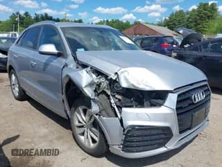 ✅ 2018 Audi Q3 Premium • VIN: WA1ECCFS0JR022112 • Lot: 42356014. Wystawiony na IAAI z przebiegiem 56 671 mil. Bezpłatny archiwum sprzedaży aukcyjnych z USA i szczegółowy raport historii pojazdu na DreamBid. Zdjęcie 1.