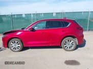 ✅ 2022 Mazda CX-5 Signature • VIN: JM3KFBXY6N0612457 • Lot: 41820607. Listed on IAAI with 51,486 mi. Free auction sales archive from the USA and detailed vehicle history report at DreamBid. Image 14.