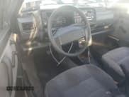 ✅ 1992 Volkswagen Golf • VIN: 3VWFA21G2NM043514 • Lot: 42501035. Wystawiony na Copart z przebiegiem 267 345 mil. Bezpłatny archiwum sprzedaży aukcyjnych z USA i szczegółowy raport historii pojazdu na DreamBid. Zdjęcie 8.