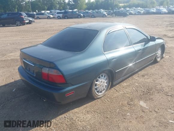 ✅ 1997 Honda Accord EX • VIN: 1HGCD5664VA069366 • Lot: 43165092. Wystawiony na IAAI z przebiegiem 153 871 mil. Bezpłatny archiwum sprzedaży aukcyjnych z USA i szczegółowy raport historii pojazdu na DreamBid. Zdjęcie 4.
