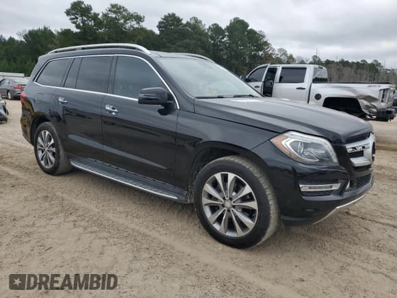 ✅ 2015 Mercedes-Benz GL 450 • VIN: 4JGDF6EE9FA587370 • Lot: 85927425. Listed on Copart with 123,068 mi. Free auction sales archive from the USA and detailed vehicle history report at DreamBid. Image 4.