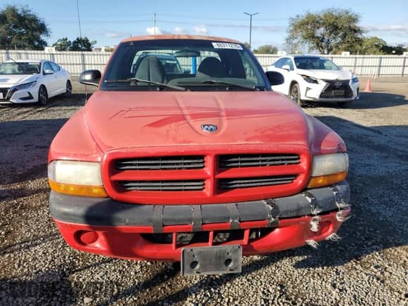 1999 Dodge Dakota SLT z VIN 1B7GL22Y9XS247522, wystawiony jako Copart lot #86311215 z przebiegiem 63 002 mil mil oraz Czysty tytuł • Clean title. Historia ofert i sprzedaży dostępna na DreamBid. Obrazek 5.