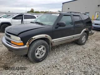 ✅ 1999 Chevrolet Blazer LS • VIN: 1GNDT13W7X2233779 • Lot: 82356325. Wystawiony na Copart z przebiegiem Nie podano. Bezpłatny archiwum sprzedaży aukcyjnych z USA i szczegółowy raport historii pojazdu na DreamBid. Zdjęcie 1.
