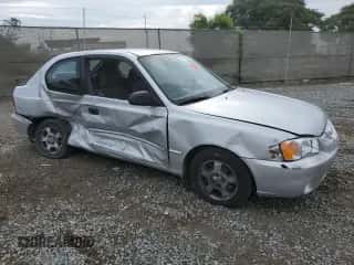 2001 Hyundai Accent GS с VIN KMHCG35CX1U138406, выставлен на аукционе Copart как лот 81693065 с пробегом 100 605 миль миль и Списание • Salvage title. История ставок и продаж доступна на DreamBid. Изображение 4.