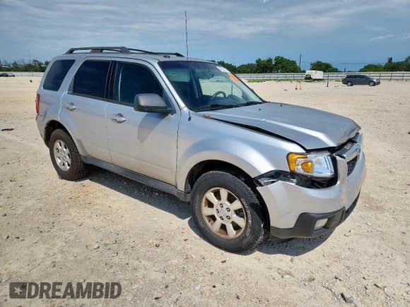 ✅ 2011 Mazda Tribute Grand Touring • VIN: 4F2CY9GG3BKM07203 • Lot: 62137295. Listed on Copart with 205,836 mi. Free auction sales archive from the USA and detailed vehicle history report at DreamBid. Image 4.