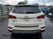 ✅ 2018 Hyundai Santa Fe Ultimate • VIN: 5XYZW4LA9JG537852 • Лот: 81812715. Опубликован ранее на Copart с пробегом 124 269 миль. Бесплатный доступ к архиву аукционных продаж из США и подробный отчёт об истории автомобиля на DreamBid. Изображение 6.