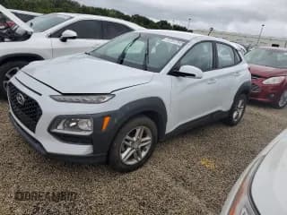 ✅ 2019 Hyundai Kona SE • VIN: KM8K12AA9KU236033 • Лот: 73751754. Опубликован ранее на Copart с пробегом 61 728 миль. Бесплатный доступ к архиву аукционных продаж из США и подробный отчёт об истории автомобиля на DreamBid. Изображение 1.