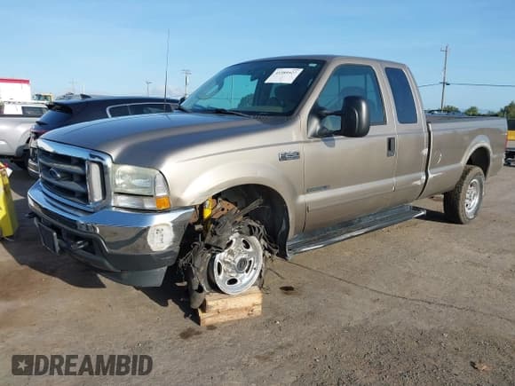 ✅ 2003 Ford F-250 XL • VIN: 1FTNX21F53EA44163 • Lot: 41989527. Wystawiony na IAAI z przebiegiem 233 059 mil. Bezpłatny archiwum sprzedaży aukcyjnych z USA i szczegółowy raport historii pojazdu na DreamBid. Zdjęcie 2.