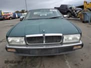 ✅ 1990 Jaguar XJ • VIN: SAJHY1742LC611694 • Lot: 81201974. Listed on Copart with 180,031 mi. Free auction sales archive from the USA and detailed vehicle history report at DreamBid. Image 5.