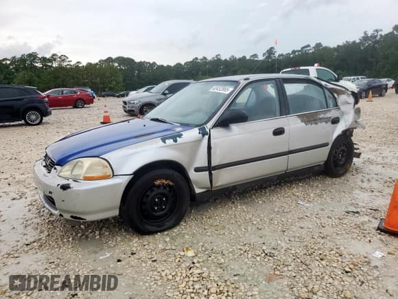 ✅ 1998 Honda Civic LX • VIN: 2HGEJ6571WH557887 • Lot: 63452865. Listed on Copart with 182,900 mi. Free auction sales archive from the USA and detailed vehicle history report at DreamBid. Image 1.