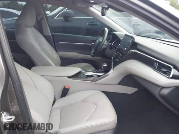 2022 Toyota Camry Hybrid XLE with VIN 4T1F31AK0NU589375, listed as a IAAI auction lot 42600441 with 28,781 mi miles and . Bid and sale history available at DreamBid. Image 5.