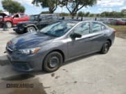 ✅ 2020 Subaru Impreza • VIN: 4S3GKAB69L3613057 • Lot: 90908865. Listed on Copart with 76,774 mi. Free auction sales archive from the USA and detailed vehicle history report at DreamBid. Image 1.