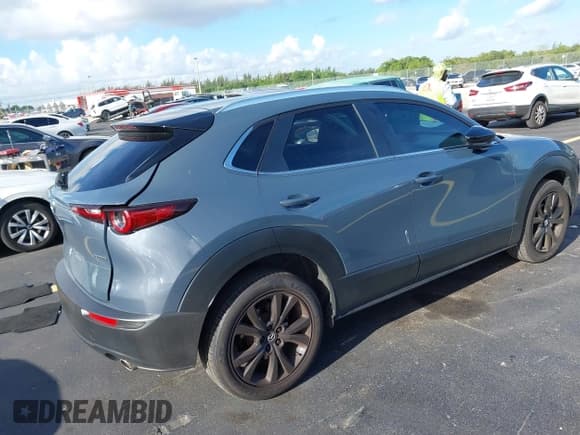 ✅ 2023 Mazda CX-30 S Carbon Edition • VIN: 3MVDMBCM6PM541737 • Lot: 42524854. Listed on IAAI with 55,093 mi. Free auction sales archive from the USA and detailed vehicle history report at DreamBid. Image 4.