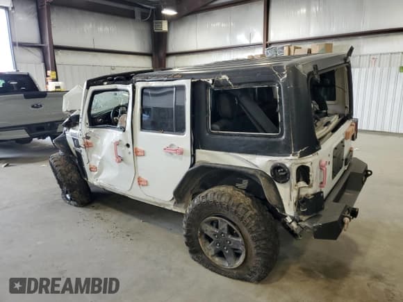 ✅ 2016 Jeep Wrangler Unlimited Freedom • VIN: 1C4BJWDG9GL199557 • Lot: 59421835. Listed on Copart with 171,838 mi. Free auction sales archive from the USA and detailed vehicle history report at DreamBid. Image 2.