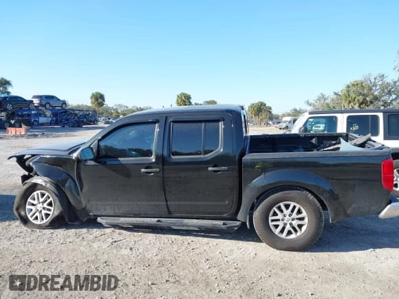 ✅ 2019 Nissan Frontier SL • VIN: 1N6AD0ER4KN773783 • Lot: 41632094. Listed on IAAI with 142,026 mi. Free auction sales archive from the USA and detailed vehicle history report at DreamBid. Image 14.