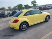 ✅ 2013 Volkswagen Beetle 2.5L • VIN: 3VWHX7AT0DM603661 • Lot: 42464030. Listed on IAAI with 95,159 mi. Free auction sales archive from the USA and detailed vehicle history report at DreamBid. Image 4.