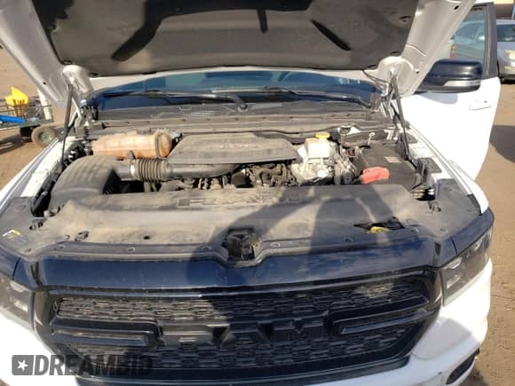 2021 Ram 1500 Big Horn z VIN 1C6SRFFM7MN734355, wystawiony jako Copart lot #62339104 z przebiegiem 100 214 mil mil oraz Czysty tytuł • Clean title. Historia ofert i sprzedaży dostępna na DreamBid. Obrazek 11.