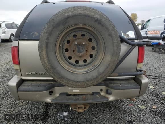 2004 Chevrolet Blazer LS z VIN 1GNCT18X64K116994, wystawiony jako Copart lot #79646694 z przebiegiem 222 831 mil mil oraz Szkoda całkowita • Salvage title. Historia ofert i sprzedaży dostępna na DreamBid. Obrazek 6.