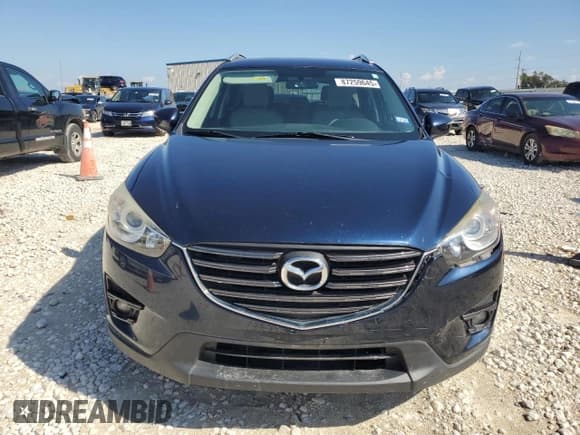 ✅ 2016 Mazda CX-5 Touring • VIN: JM3KE2CY4G0863800 • Lot: 87259645. Listed on Copart with 155,675 mi. Free auction sales archive from the USA and detailed vehicle history report at DreamBid. Image 5.