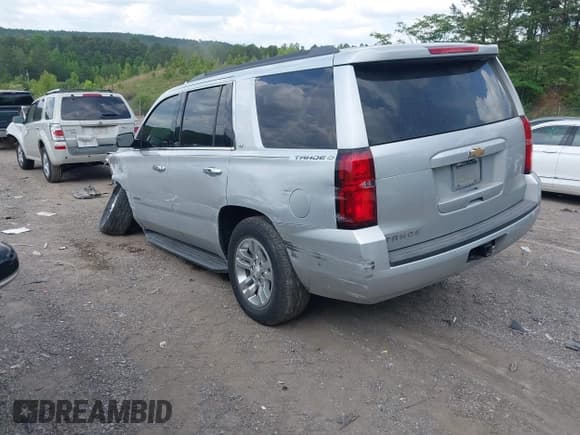 ✅ 2018 Chevrolet Tahoe LT • VIN: 1GNSCBKC3JR112590 • Lot: 42156796. Listed on IAAI with 124,120 mi. Free auction sales archive from the USA and detailed vehicle history report at DreamBid. Image 3.