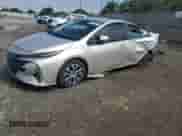 2021 Toyota Prius LE z VIN JTDKAMFP6M3186049, wystawiony jako Copart lot #81289905 z przebiegiem 271 061 mil mil oraz Szkoda całkowita • Salvage title. Historia ofert i sprzedaży dostępna na DreamBid. Obrazek 1.
