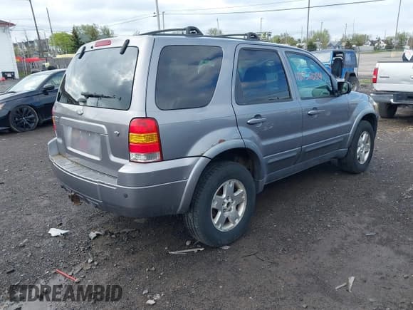 ✅ 2007 Ford Escape Limited • VIN: 1FMCU94167KA76261 • Lot: 42152654. Listed on IAAI with 139,019 mi. Free auction sales archive from the USA and detailed vehicle history report at DreamBid. Image 4.