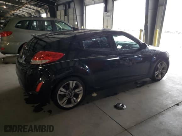 2012 Hyundai Veloster w/Red Int z VIN KMHTC6AD1CU054411, wystawiony jako Copart lot #73357964 z przebiegiem 12 486 mil mil oraz Szkoda całkowita • Salvage title. Historia ofert i sprzedaży dostępna na DreamBid. Obrazek 3.