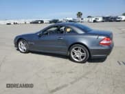 ✅ 2007 Mercedes-Benz SL 550 • VIN: WDBSK71F87F134260 • Lot: 55162925. Listed on Copart with 124,705 mi. Free auction sales archive from the USA and detailed vehicle history report at DreamBid. Image 2.