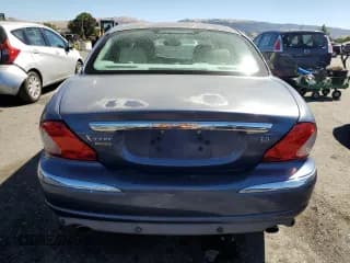 ✅ 2004 Jaguar X-Type • VIN: SAJEA51C74WD75027 • Lot: 67503694. Listed on Copart with 92,796 mi. Free auction sales archive from the USA and detailed vehicle history report at DreamBid. Image 6.